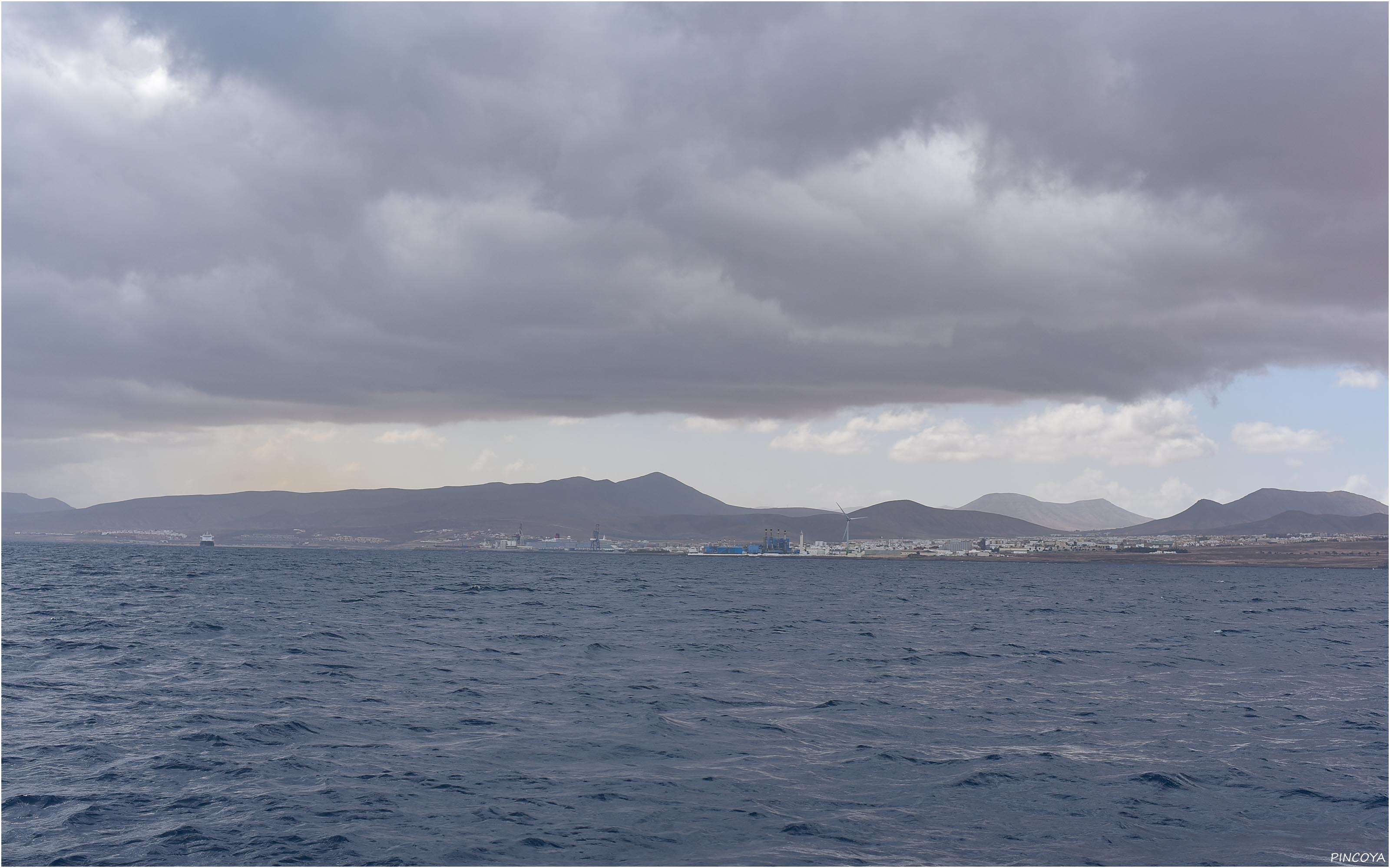 „Puerto del Rosario trüb und in Wolken, aber mit Wind.“